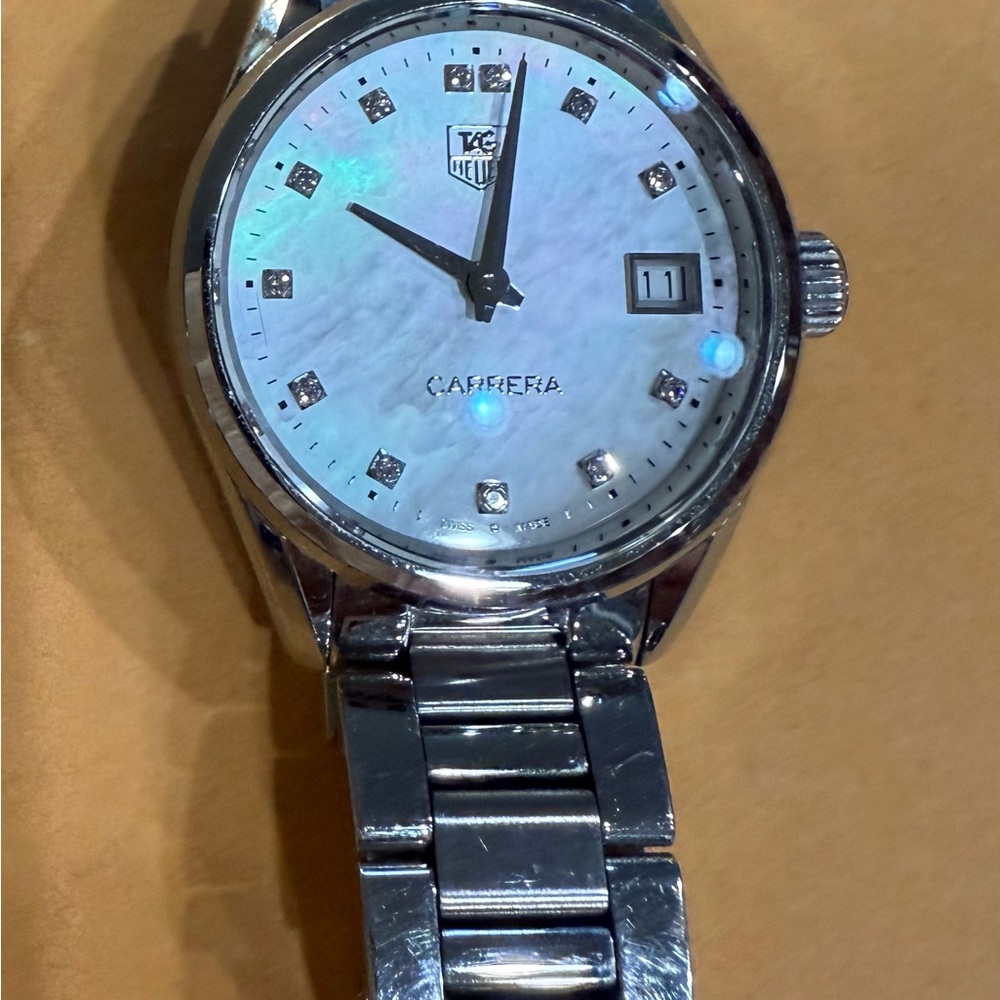 Tag Heuer Watch. Like new. Paid 1,500$ will sell for $600 obo.